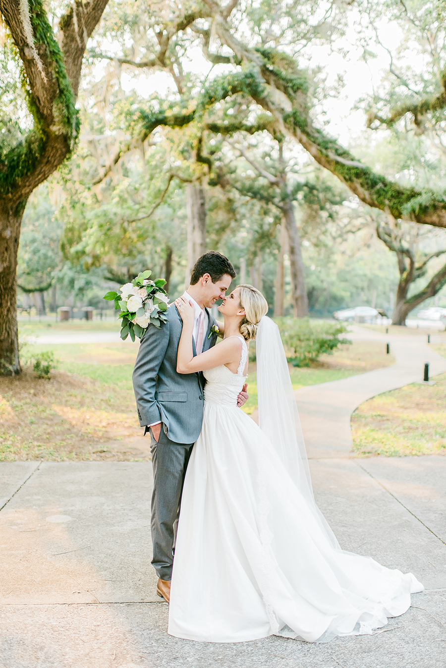 Bride and groom posing for gainesville wedding photographer