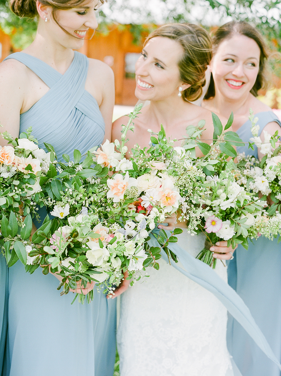 bridesmaids with dusty blue dresses