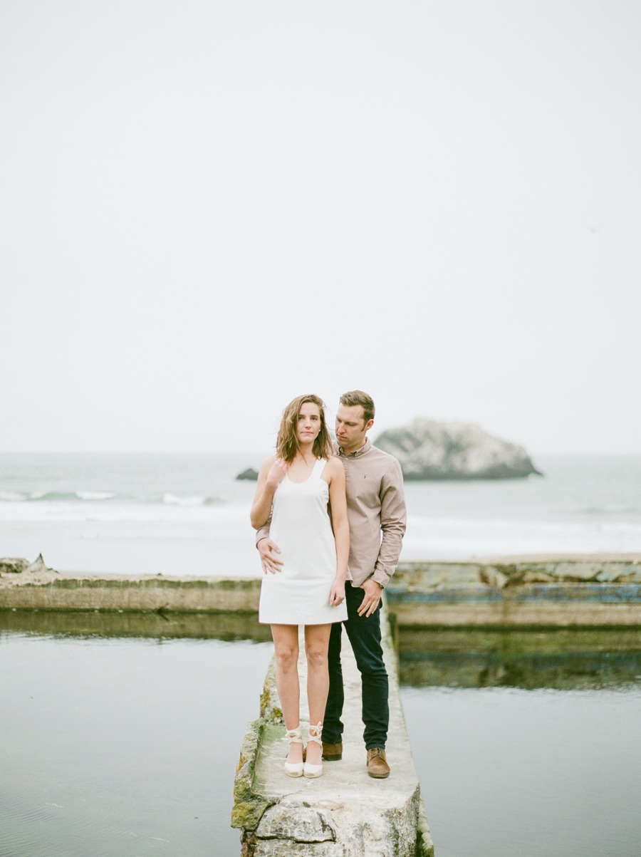 Couple standing by Sutro Baths pool